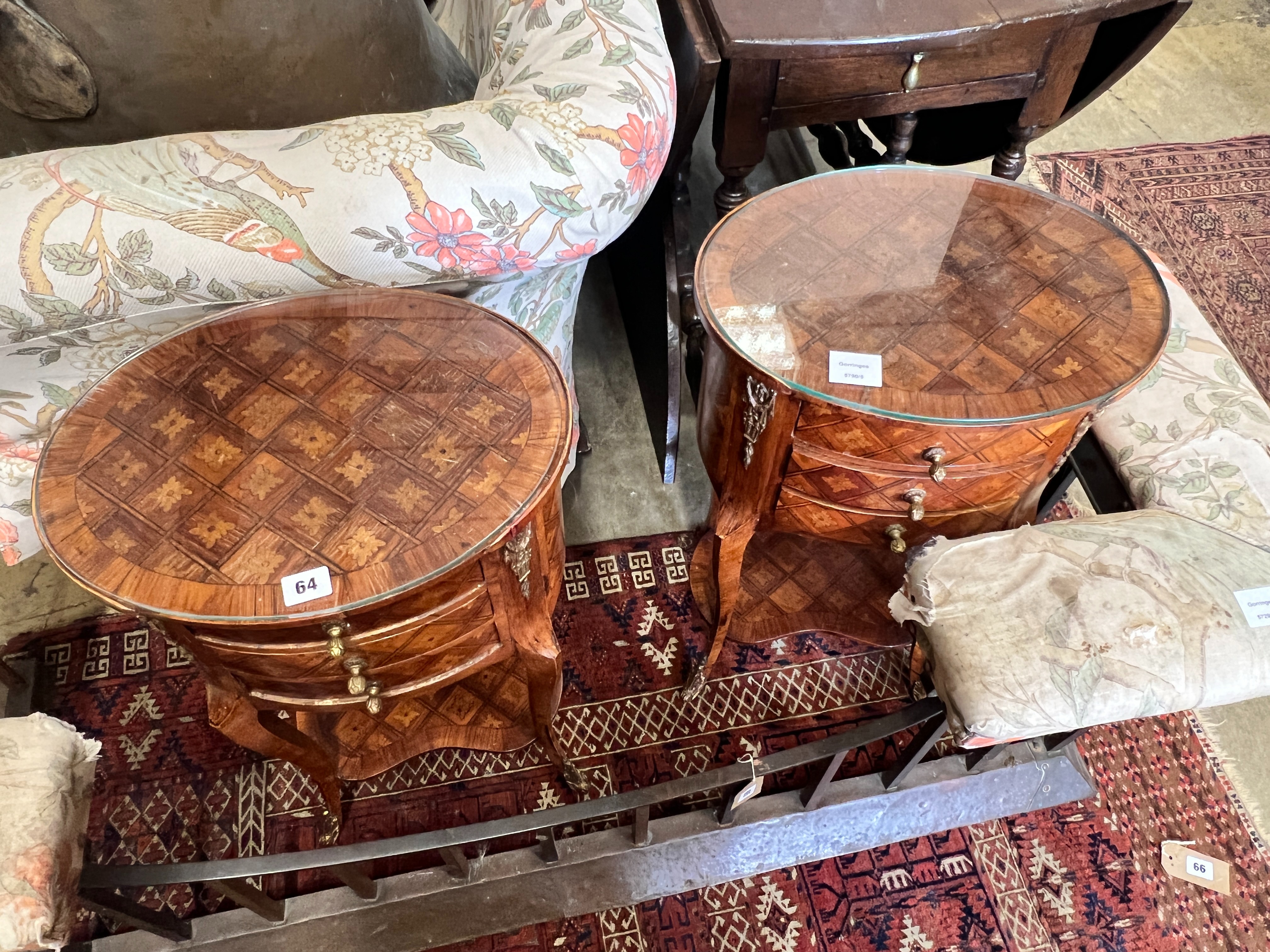 A pair of French transitional style oval parquetry inlaid bedside cupboards, kidney shaped under tiers, width 40cm, depth 30cm, height 69cm